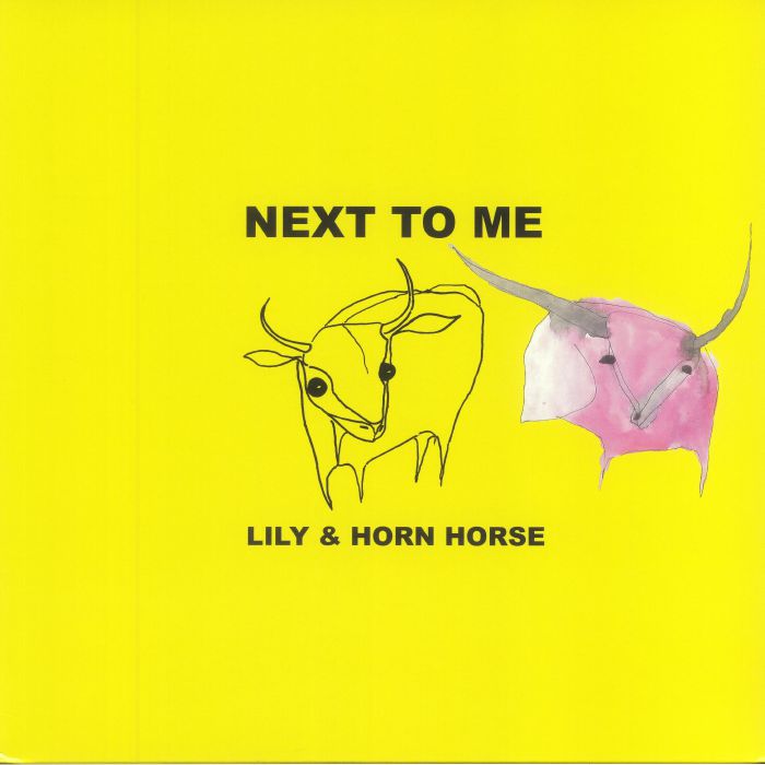 Lily and The Horn Horse Next To Me